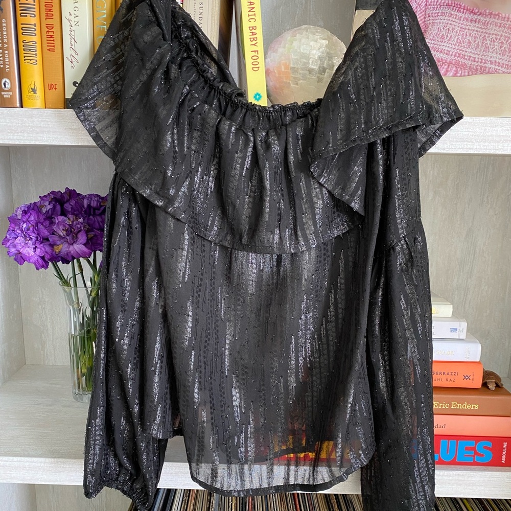 Never worn shiny black off the shoulder blouse